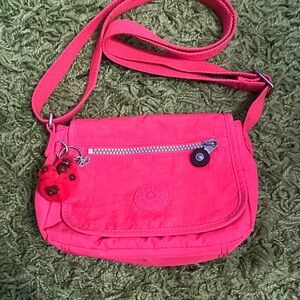 Kipling Pink Crossbody Bag with Adjustable Strap and Silver Zipper